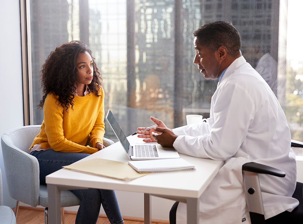 Patient and doctor talking